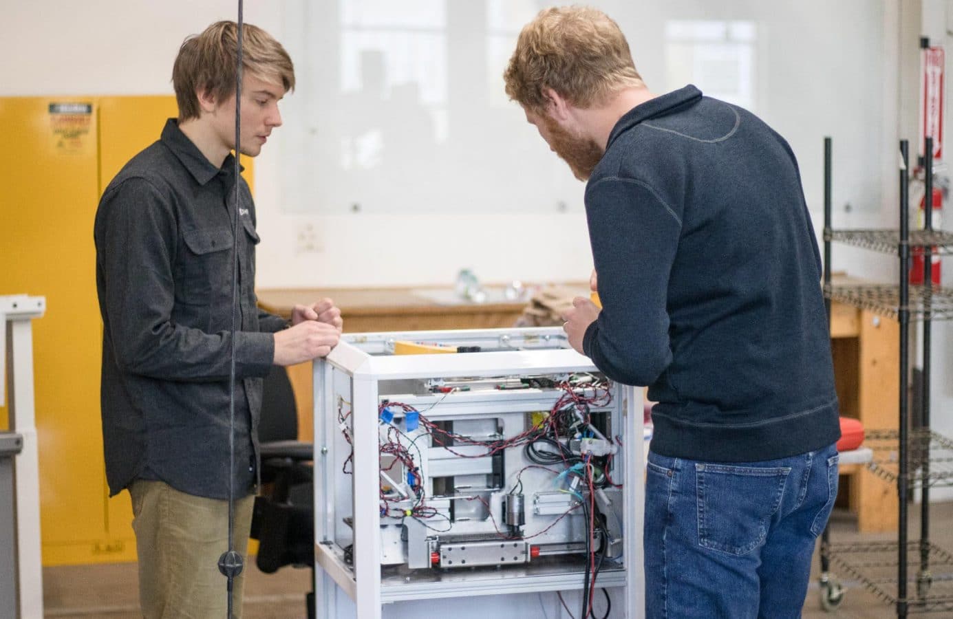 Two Engineers working on the electronics of Nessie