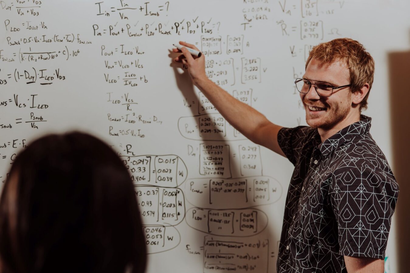 Electronics engineer math on whiteboard